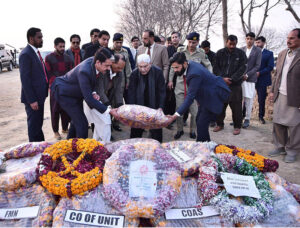 President Asif Ali Zardari offering Fateha at the grave of Major Hamza Israr Shaheed, who embraced martyrdom in North Waziristan