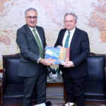 Federal Secretary Economic Affairs, Dr. Kazim Niaz, presenting souvenir to Tamas Vargha, Hungarian Deputy Minister for Defence