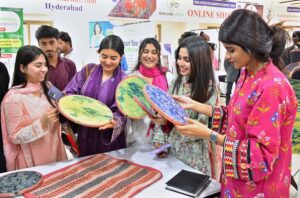 Senior economist of World Bank MS.INGA Afanasieva and Vice Chancellor SABS university of Jamshoro Prof Dr.Arabella Bhutto cutting the ribbon during inauguration ceremony of Idea Preneurship Summit of university of Sufism and modern sciences of Bhitshah at SABS university.