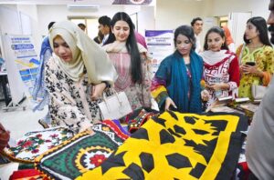 Senior economist of World Bank MS.INGA Afanasieva and Vice Chancellor SABS university of Jamshoro Prof Dr.Arabella Bhutto cutting the ribbon during inauguration ceremony of Idea Preneurship Summit of university of Sufism and modern sciences of Bhitshah at SABS university.