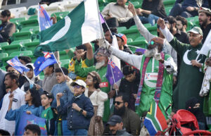 Spectators enjoying during the Tri-Nation’s one-day international cricket match between South Africa and New Zealand at the Gaddafi Stadium.