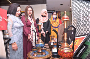 Women visiting stalls during 3 day exhibition of organized by women chamber of commerce at Burj Hurara.