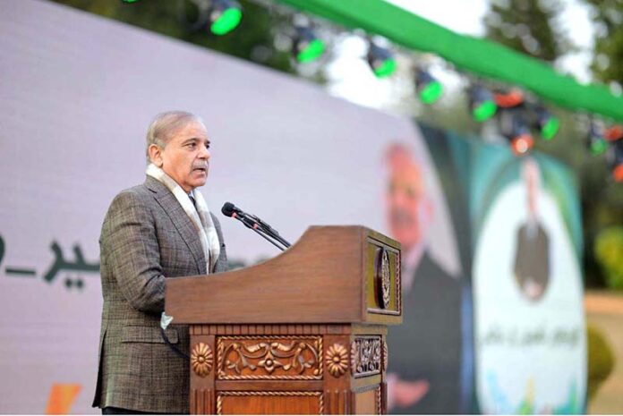 Prime Minister Muhammad Shehbaz Sharif addresses a ceremony organized in connection with Youm-e-Tameer-o-Taraqqi