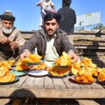 Vendor selling and displaying orange to attract the customer at Fruit Market