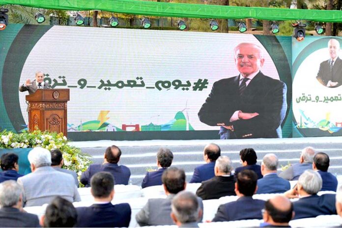 Prime Minister Muhammad Shehbaz Sharif addresses a ceremony organized in connection with Youm-e-Tameer-o-Taraqqi