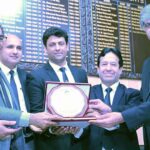 President District Bar Association Irfanullah Warraich Advocate, Secretary Chaudhry Afzal Aslam presenting a shield to renowned national poet Shahid Zaki at the annual Mehfil Mushaira