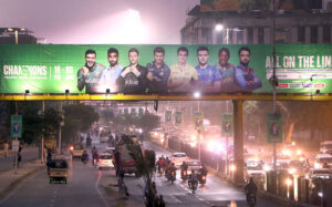A view of a billboard featuring a player's picture displayed near the National Stadium ahead of the Champions Trophy 2025.