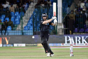 New Zealand's Devon Conway watches the ball after playing a shot during the final one-day international (ODI) cricket match of Tri-Nation series between Pakistan and New Zealand at the National Stadium