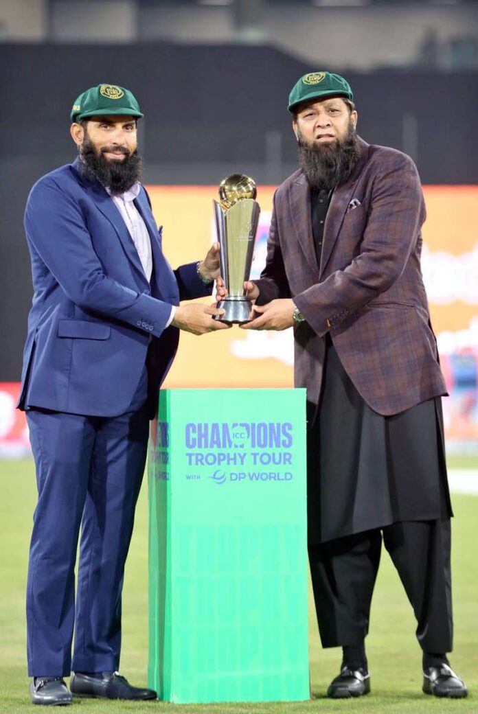 Pakistan former cricket players Misbah-ul-Haq and Inzimam-ul-Haq with ICC Champion Trophy 2025 during first match of Tri-Nation Series played between Pakistan and New Zealand cricket teams at Gaddafi Stadium