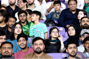 A view of enthusiastic cricket fans crowd through the camera lens during the Tri-Nation Series Final ODI between Pakistan and New Zealand at the National Stadium, Karachi