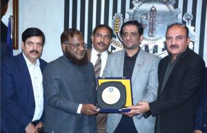 Federal Tax Ombudsman Dr Asif Mahmood Jah is addressing the business community during his visit to Faisalabad Chamber of Commerce & Industry (FCCI).