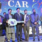 Governor of Khyber Pakhtunkhwa (KPK), Faisal Karim Kundi and Governor of Punjab, Sardar Saleem Haider Khan presented a car key to an employee for best performance during the 9th Bell Medex Annual Ceremony