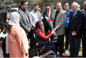 Chairman Prime Minister Youth Program, Rana Mashhood Ahmed Khan, addresses the audience after inaugurating the PMYP Boxing Kick-off Punjab Drive and All Pakistan Women's Football opening ceremony at Punjab University New Campus.