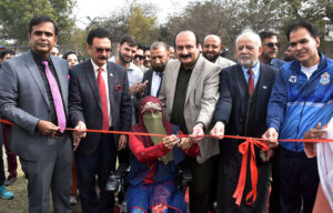 Chairman Prime Minister Youth Program, Rana Mashhood Ahmed Khan, addresses the audience after inaugurating the PMYP Boxing Kick-off Punjab Drive and All Pakistan Women's Football opening ceremony at Punjab University New Campus.