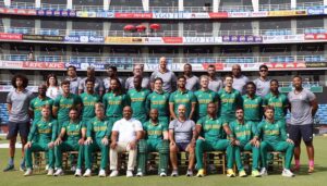 The South Africa cricket team poses for a group photo with officials ahead of their match against Pakistan in the Tri-Nation Series' third One-Day International (ODI) at the National Bank Stadium