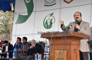 Chairman Prime Minister Youth Program, Rana Mashhood Ahmed Khan, addresses the audience after inaugurating the PMYP Boxing Kick-off Punjab Drive and All Pakistan Women's Football opening ceremony at Punjab University New Campus.
