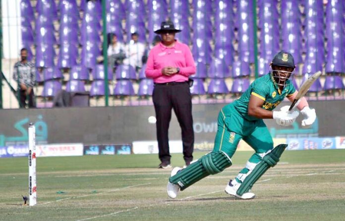 South Africa's captain Temba Bavuma prepares to run after striking the ball during the Tri-Nation series third one-day international (ODI) cricket match between Pakistan and South Africa at the National Stadium in Karachi