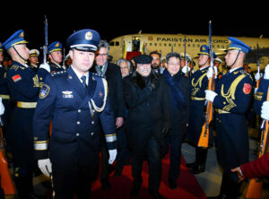 President Asif Ali Zardari being welcomed by the Chinese Finance Minister, Mr Lan Fo'an, upon his arrival at the Beijing International Airport