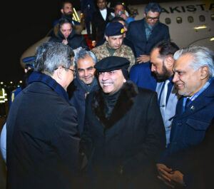 President Asif Ali Zardari being welcomed by the Chinese Finance Minister, Mr Lan Fo'an, upon his arrival at the Beijing International Airport