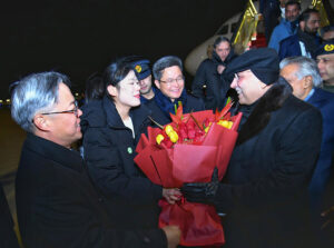 President Asif Ali Zardari being welcomed by the Chinese Finance Minister, Mr Lan Fo'an, upon his arrival at the Beijing International Airport