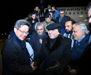 President Asif Ali Zardari being welcomed by the Chinese Finance Minister, Mr Lan Fo'an, upon his arrival at the Beijing International Airport