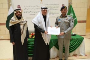 Saudi ambassador hands over travel documents to Pakistani Umrah pilgrims invited as state guests