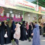 Women in a queue to purchase different items from Ramzan Sahulat Bazar organized by Punjab Govt at Modal Mart