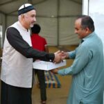 Ambassador Faisal Niaz Tirmizi, Pakistan's Envoy to the UAE, distributes food boxes at the Ramadan Iftar tent setup by Vista Maritime Travel and Tourism at Port Rashid