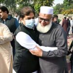 Federal Minister for Railways Hanif Abbasi exchanging Eid greetings with people after offering Eidul-Fitr prayers at Al- Aqsa Park, Satellite Town
