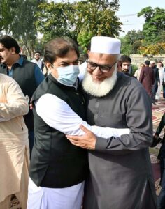 Federal Minister for Railways Hanif Abbasi exchanging Eid greetings with people after offering Eidul-Fitr prayers at Al- Aqsa Park, Satellite Town