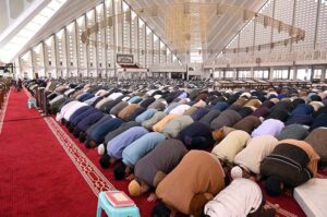 A large number of faithful offering Namaz-e-Jumma (Friday Prayer) at Faisal Masjid during Holy fasting month of Ramzan ul Mubarak.