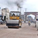 Heavy machinery is being used to widen the road as part of ongoing development work in the city