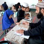 Children learning to recite Noorani Qaida from Qari at Jamia Masjid Al-Noor during the holy fasting month of Ramadan at G-7 in the Federal Capital