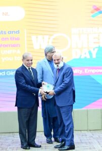 Prime Minister Muhammad Shehbaz Sharif presents awards to private companies who implemented family friendly policies, at International Women's Day ceremony.