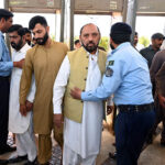 Police officials conduct security checks of faithful before Namaz-e-Juma-tul-Wida at Faisal Masjid during the holy month of Ramzan