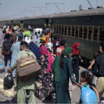 A large number of passengers boarding Eid Special Trains at the railway station, heading to their hometowns to celebrate Eid-ul-Fitr with their families