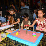 Students enjoy playing games during open day fun festival of local school at Afandi town