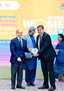 Prime Minister Muhammad Shehbaz Sharif presents awards to private companies who implemented family friendly policies, at International Women's Day ceremony.