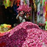 A vendor displaying the flowers to attract the customers in connection with Eidul Fitr at Flowers Market