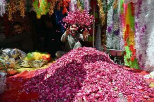 A vendor displaying the flowers to attract the customers in connection with Eidul Fitr at Flowers Market