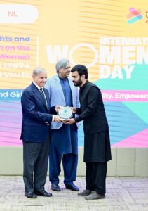 Prime Minister Muhammad Shehbaz Sharif presents awards to private companies who implemented family friendly policies, at International Women's Day ceremony.
