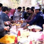 People purchasing different food items from stall for iftar at Sasta Ramadan bazaar Aabpara in the Federal Capital