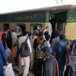 A large number of passengers boarding Eid Special Trains at the railway station, heading to their hometowns to celebrate Eid-ul-Fitr with their families