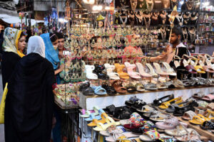 Women busy shopping on Chaand Raat in preparation for Eid ul Fitr at local market