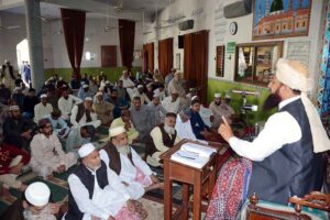 The Imam delivers the Jumma sermon during the first Friday prayer of the holy month of Ramadan at the masjid in Mohalla Siddiqabad.