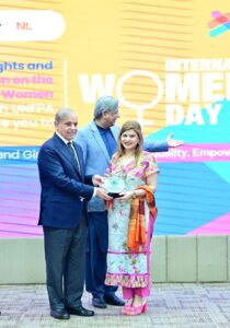 Prime Minister Muhammad Shehbaz Sharif presents awards to private companies who implemented family friendly policies, at International Women's Day ceremony.