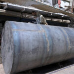 A worker busy welding and repairing petrol tank at fort road
