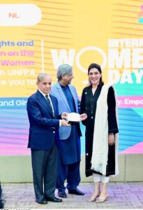 Prime Minister Muhammad Shehbaz Sharif presents awards to private companies who implemented family friendly policies, at International Women's Day ceremony.