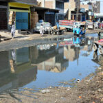 A view of sewerage water accumuled on Subzi Mandi Road causes inconvenience for citizens, demanding immediate action from authorities