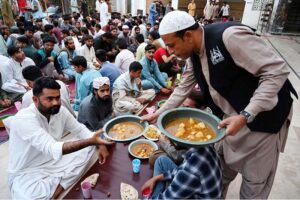 People offering Dua before breaking fast (Iftar) during Holy Month of Ramzan at Jamia Muhammadi Masjid.